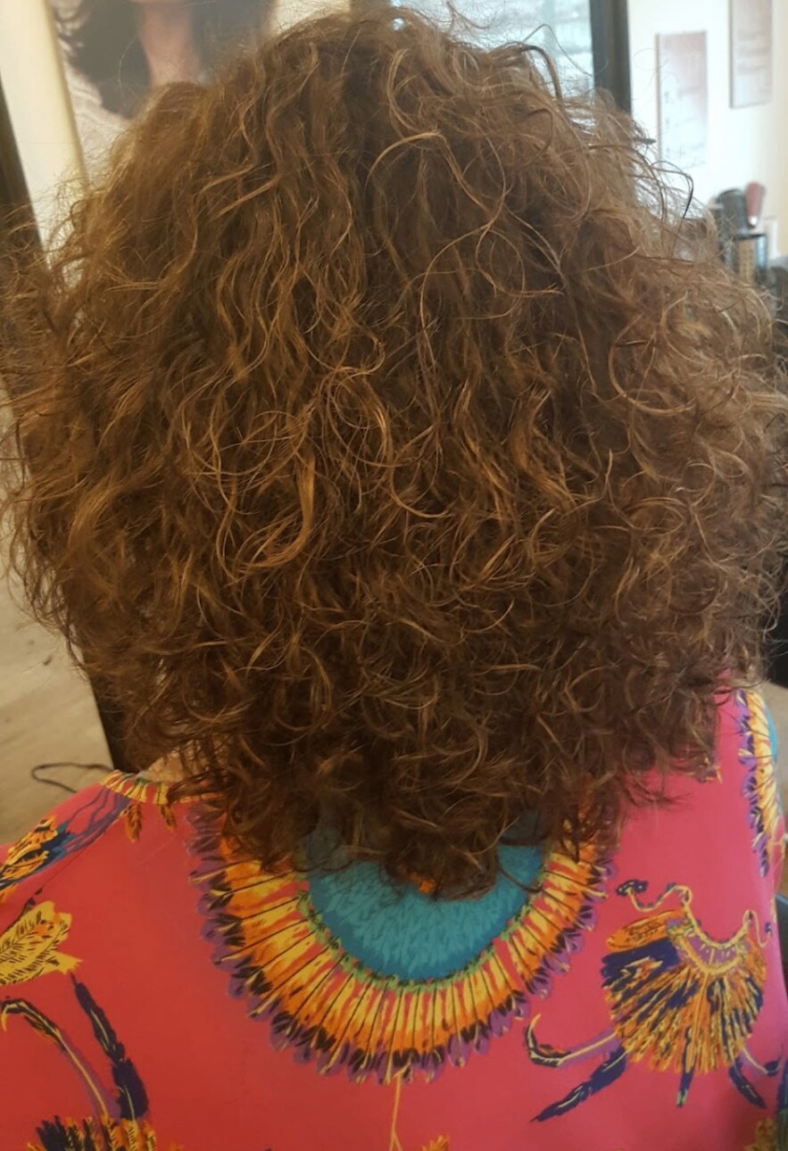Rich auburn natural curls